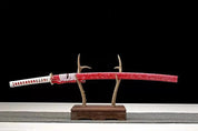 Rote Klinge Katana – Nahaufnahme Katana mit japanischem Motiv